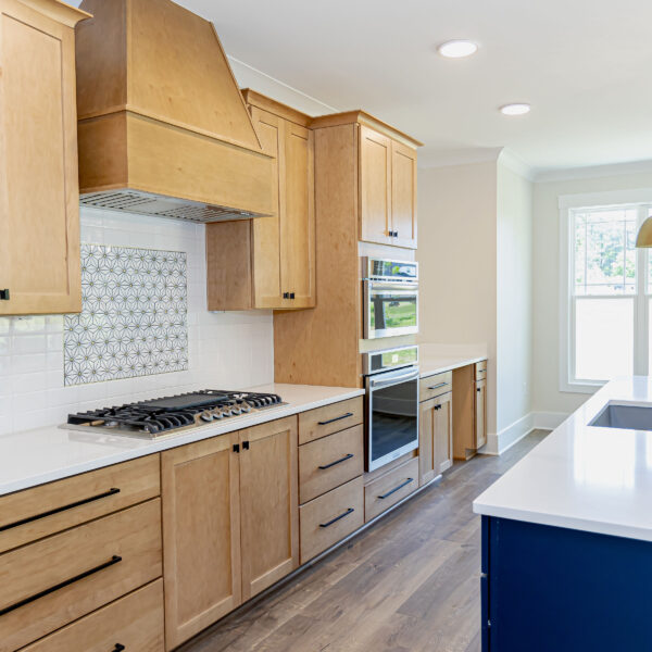 Winslow Custom Homes Kitchen with light wood cabinets