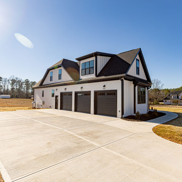 Winslow Custom Homes Exterior Three Car Garage Dark Brown