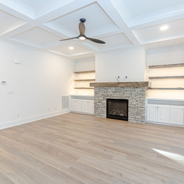 Winslow Custom Homes Living room with stone fireplace