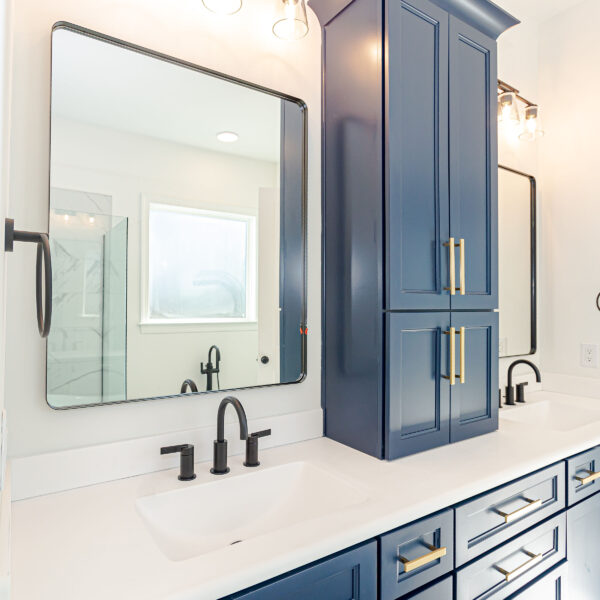 Custom Home Builder Unique Bathroom Blue Cabinets