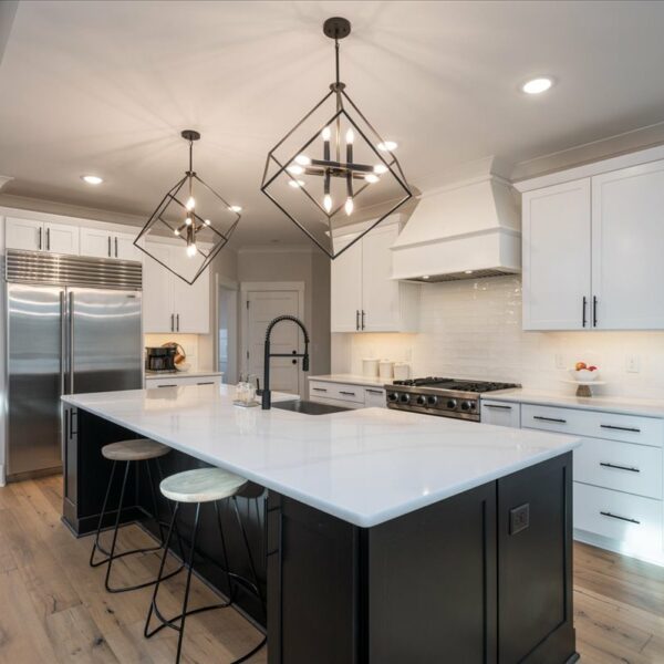 Winslow Custom Homes Kitchen with black island and white cabinets