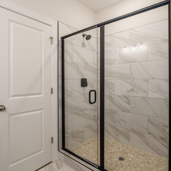 Custom Home Builder Master Bathroom Black Shower Door