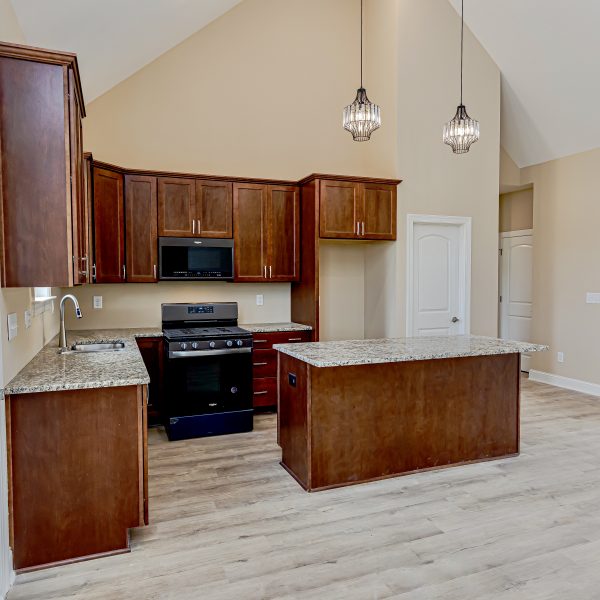 Winslow Custom Homes Kitchen with dark wood cabinets