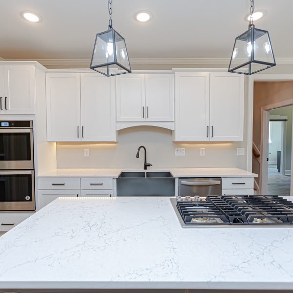 Winslow Custom Homes White cabinets with arch