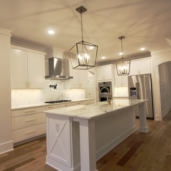 Winslow Custom Homes Kitchen with farmhouse doors