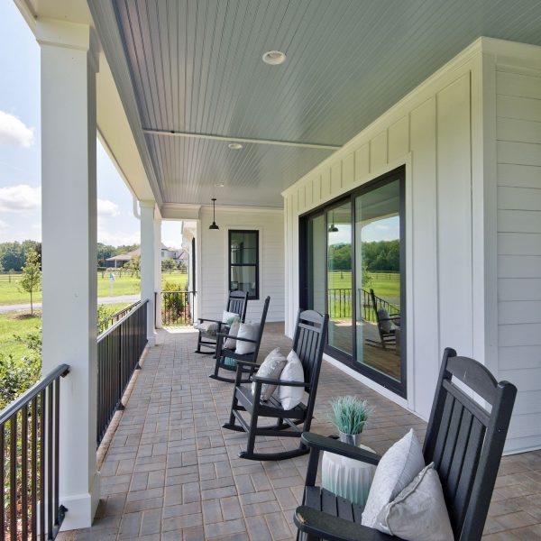 Winslow Custom Homes Front Porch with Black Rocking Chairs